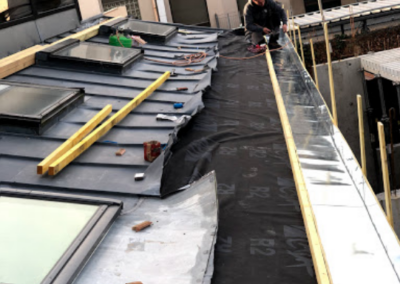 Travaux de rénovation et isolation sur toiture plate
