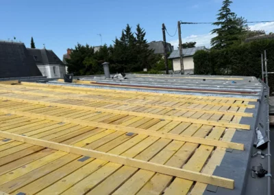 Travaux de réfection d'une toiture en tuiles réalisés par Entreprise Christophe à Boulogne-Billancourt